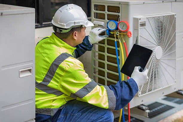 Professional Ductwork Repair technician working in State Center, IA